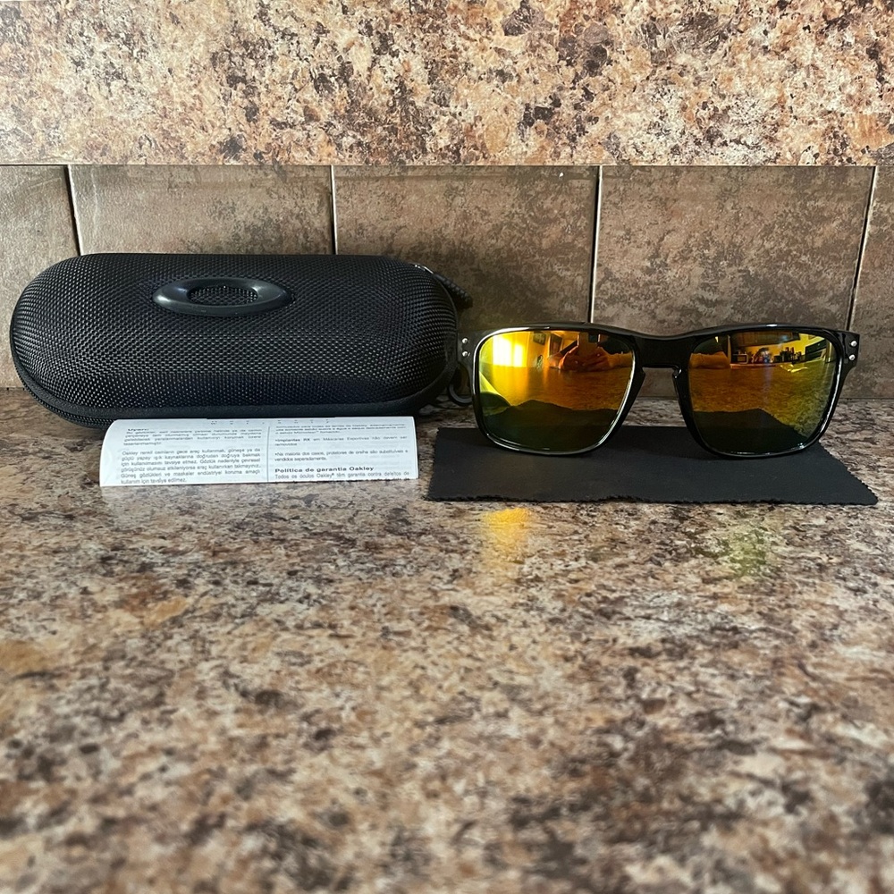 Oakley Black and Gold Sunglasses